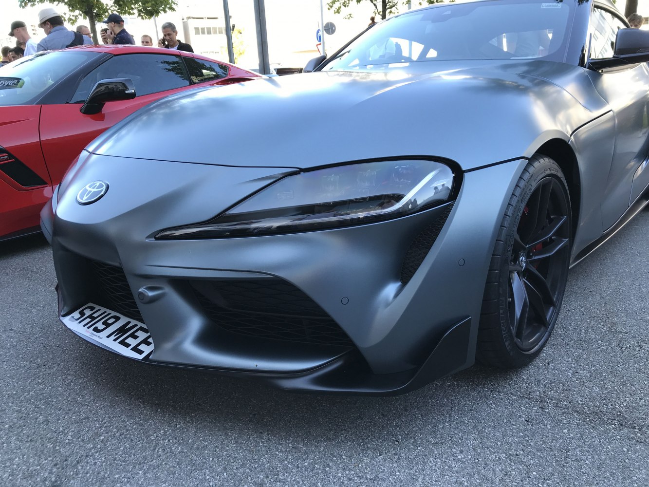 Close-up front view highlighting sleek headlights and aerodynamic bumper design.