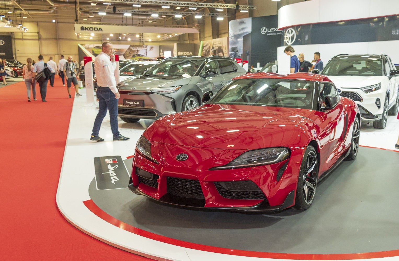 Red sports car front view with aerodynamic design and aggressive styling