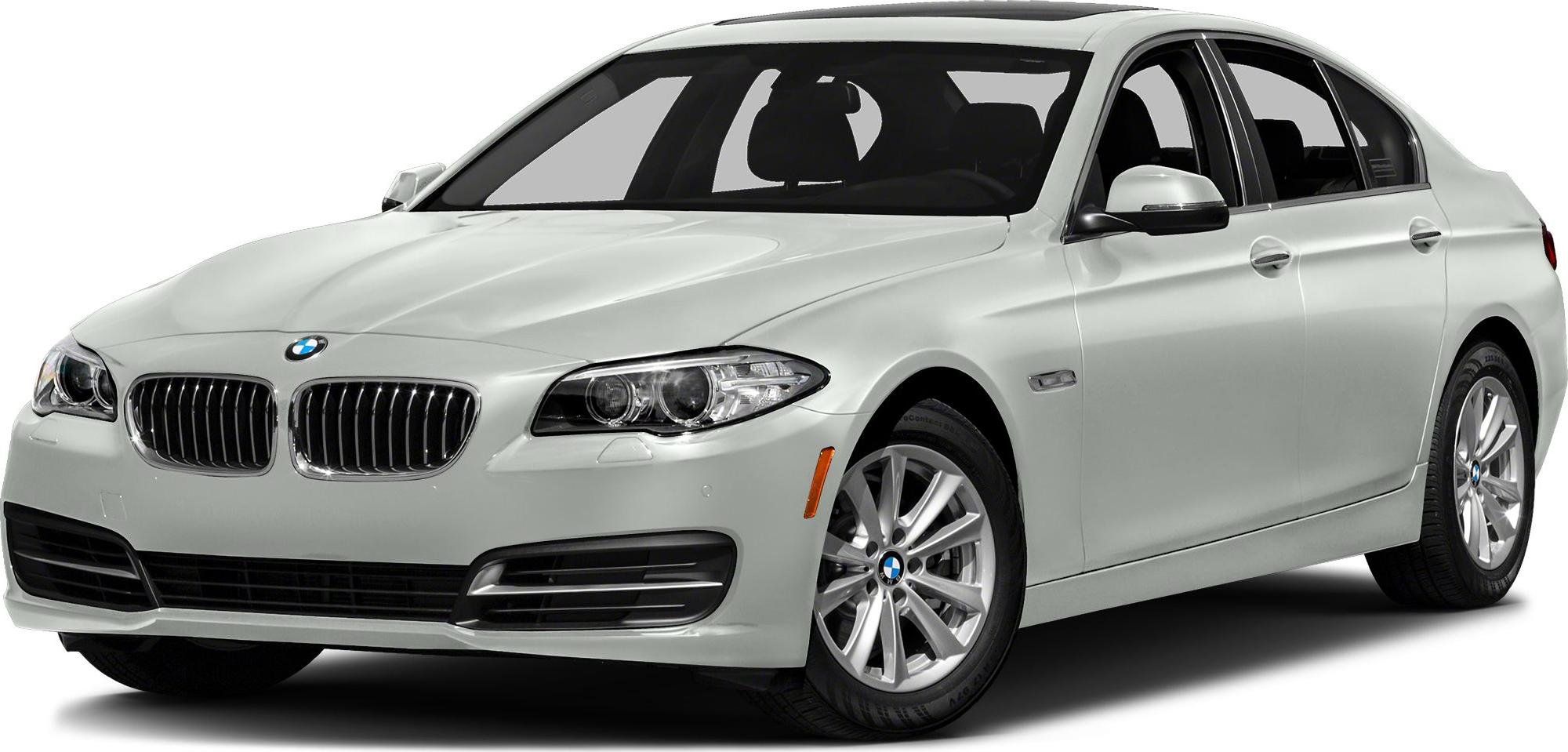 Front-side view of silver luxury sedan with distinctive grille and headlights