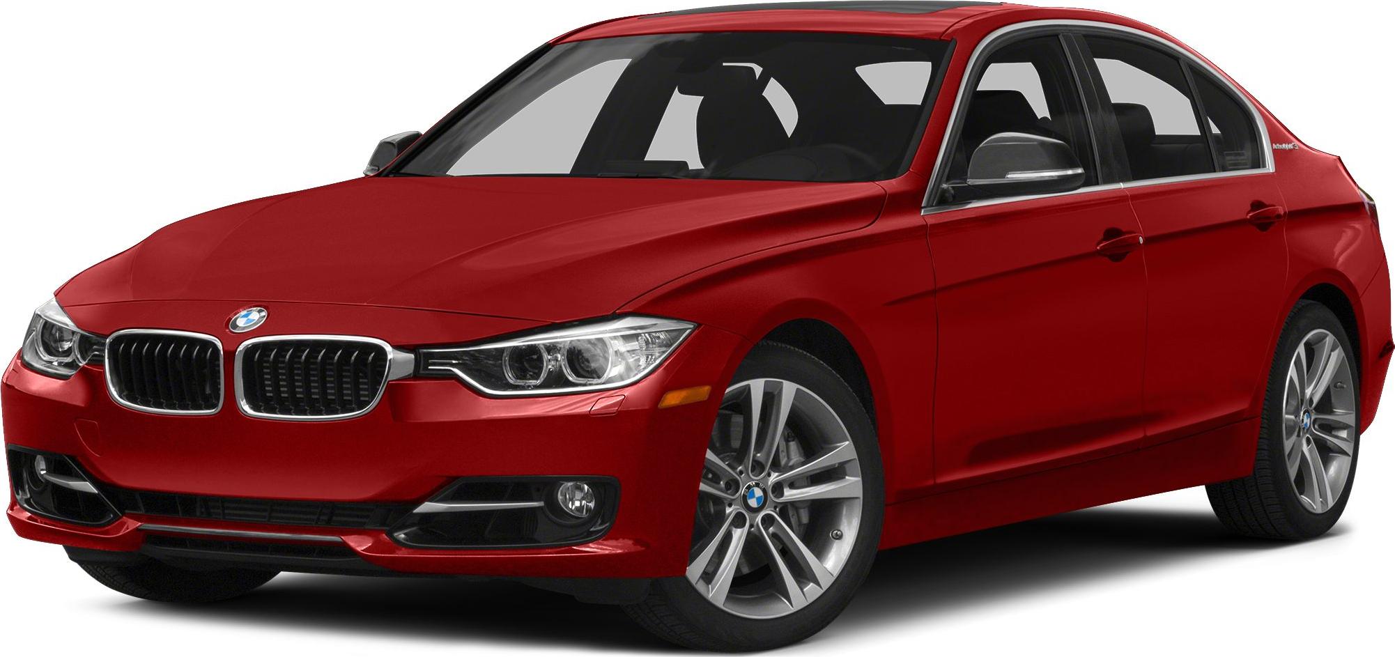 Red sedan front-side view with distinctive headlights and alloy wheels