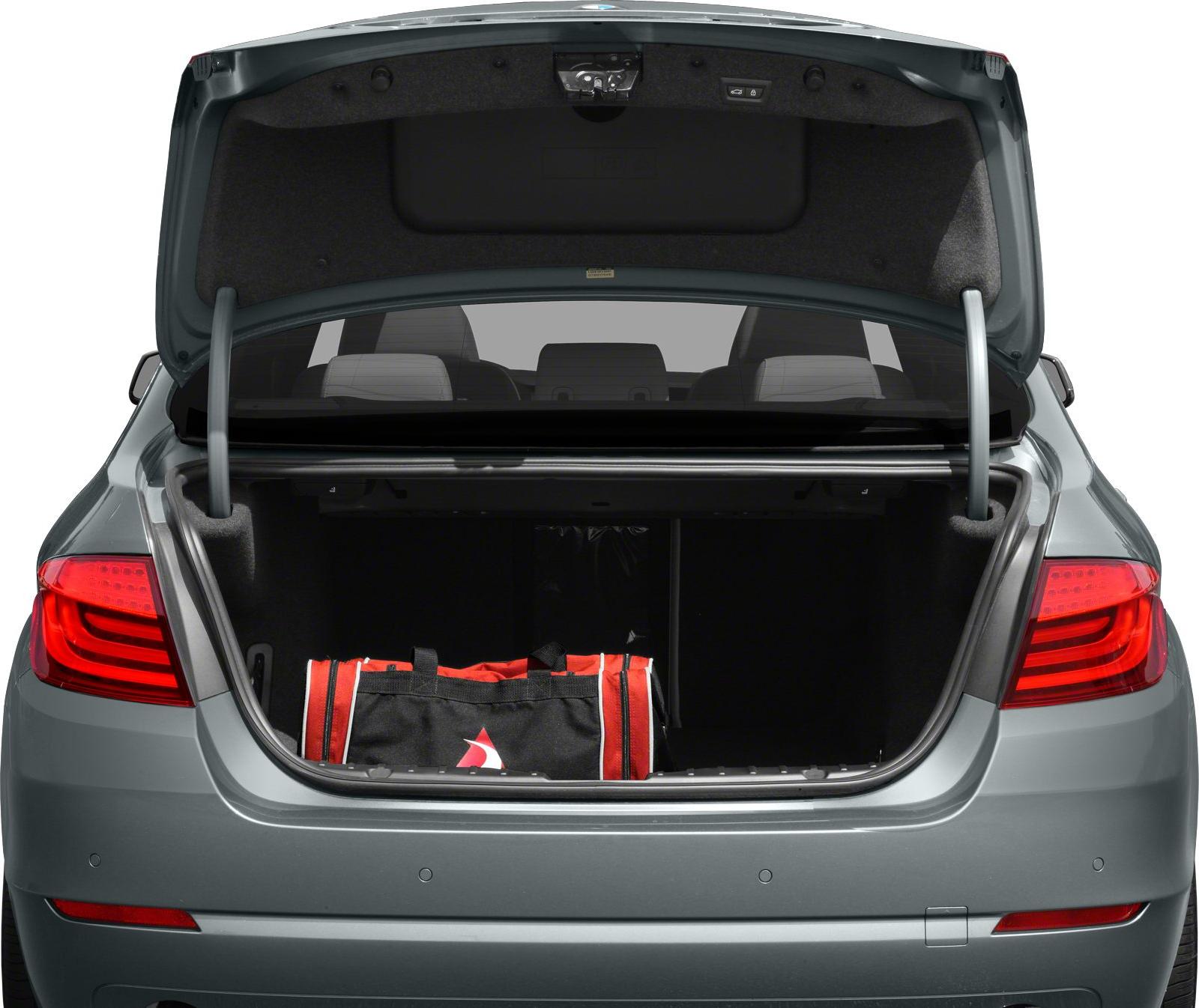 Large open trunk space with a bag inside and visible rear seats.