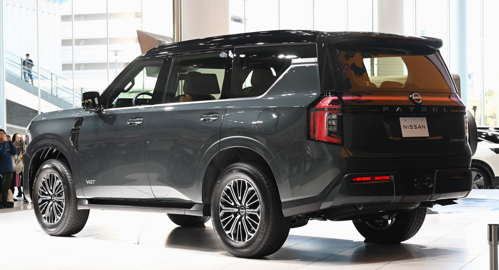 Rear and side view of a modern SUV with sleek design and distinctive taillights