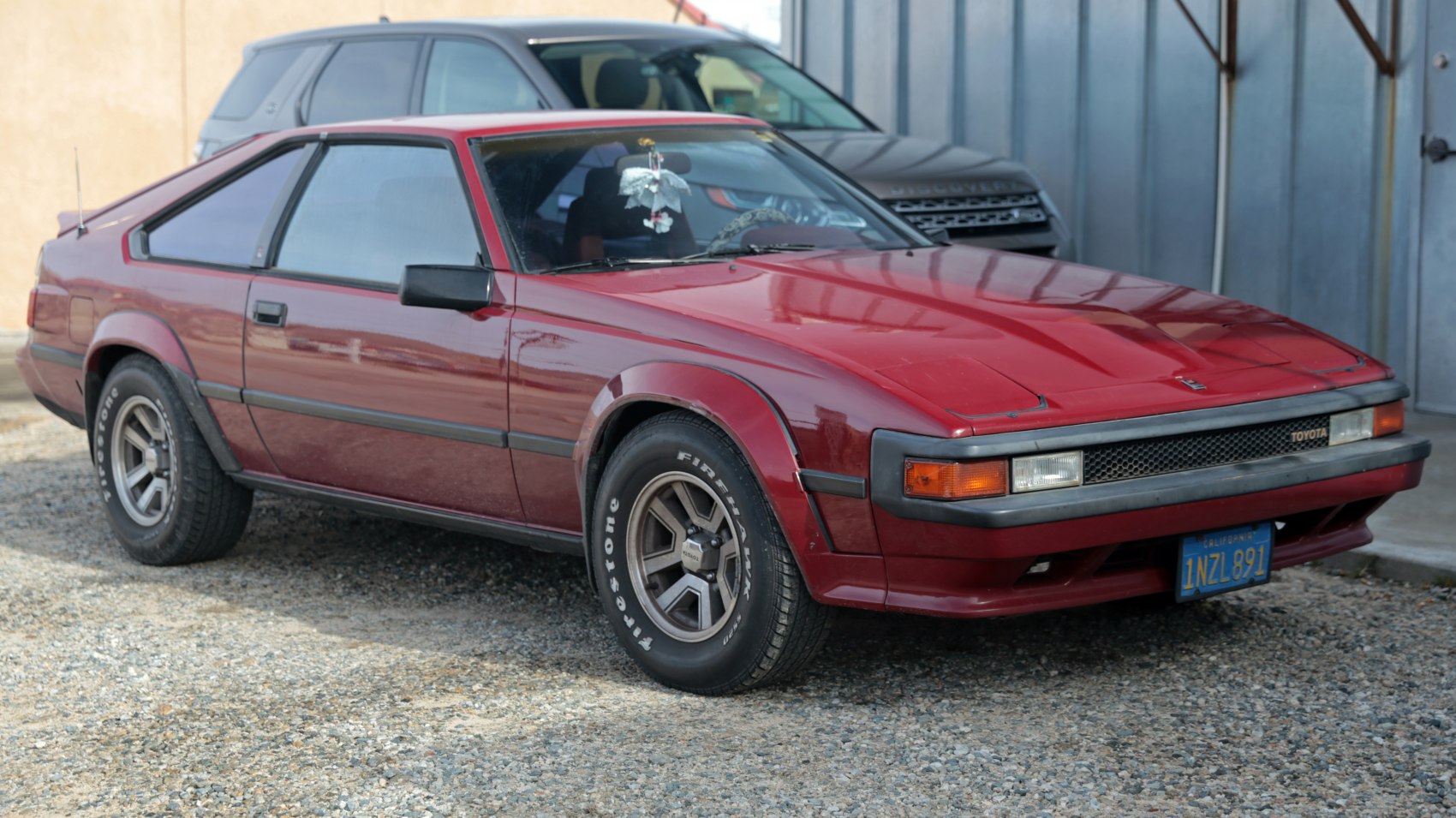 Classic 1981 sports coupe with sharp lines and retro design.