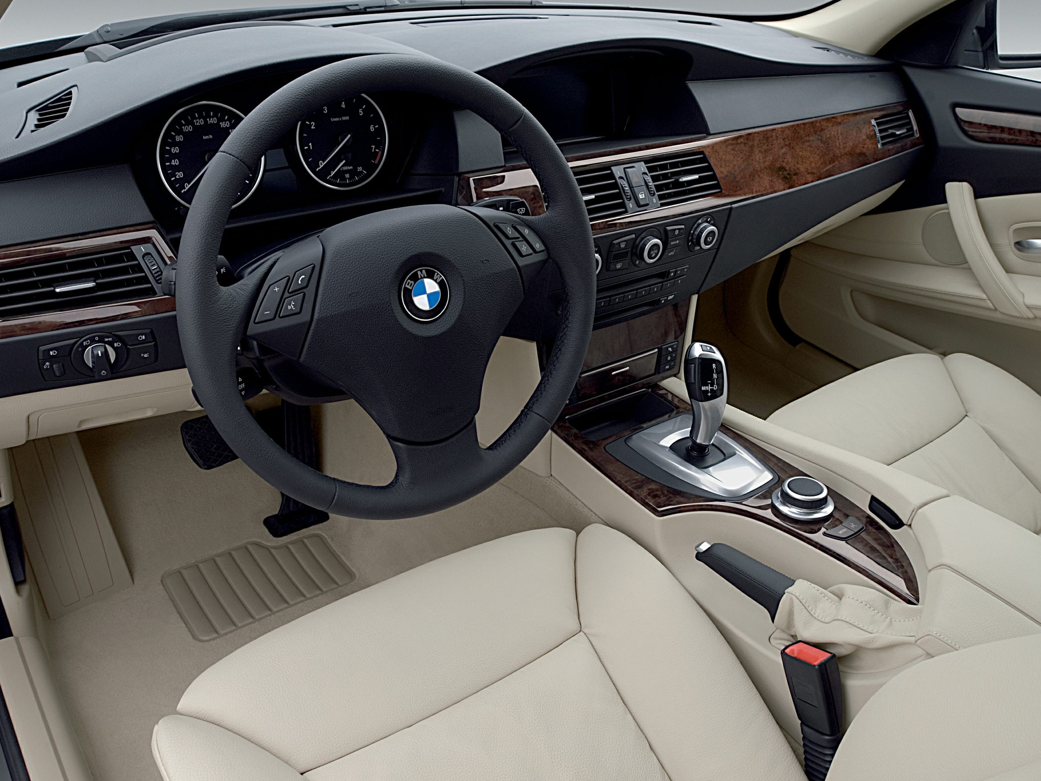 Leather steering wheel and wood grain dashboard trim