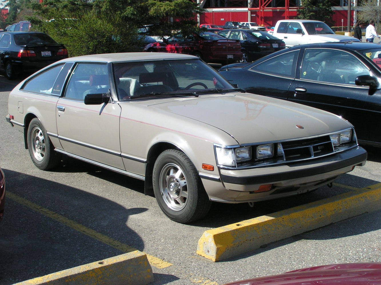 1970s sports coupe with quad headlights and hatchback rear