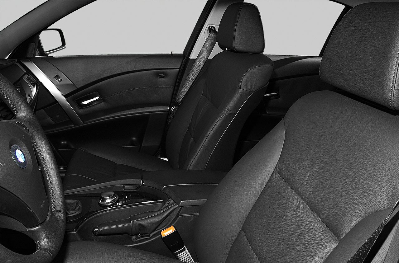 Leather seats and dashboard panel with control knob