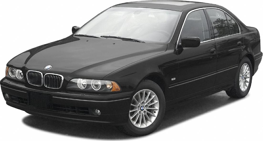 Black sedan with distinct front grille and dual round headlights