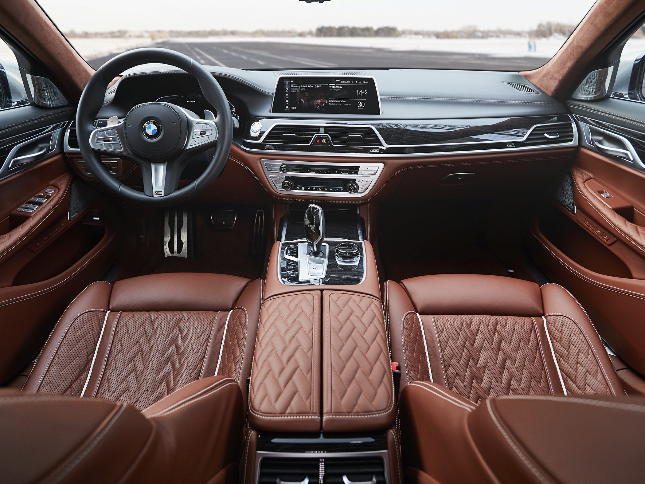 Brown leather interior with digital dashboard and advanced gear selector