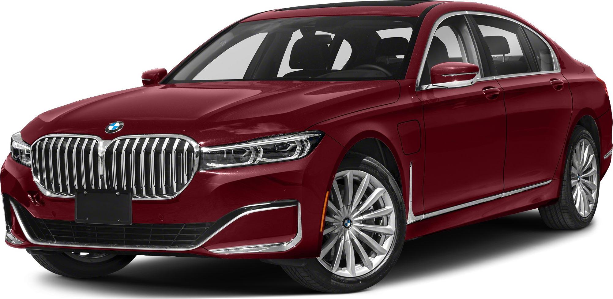 Front-side luxury sedan with large chrome grille and LED headlights