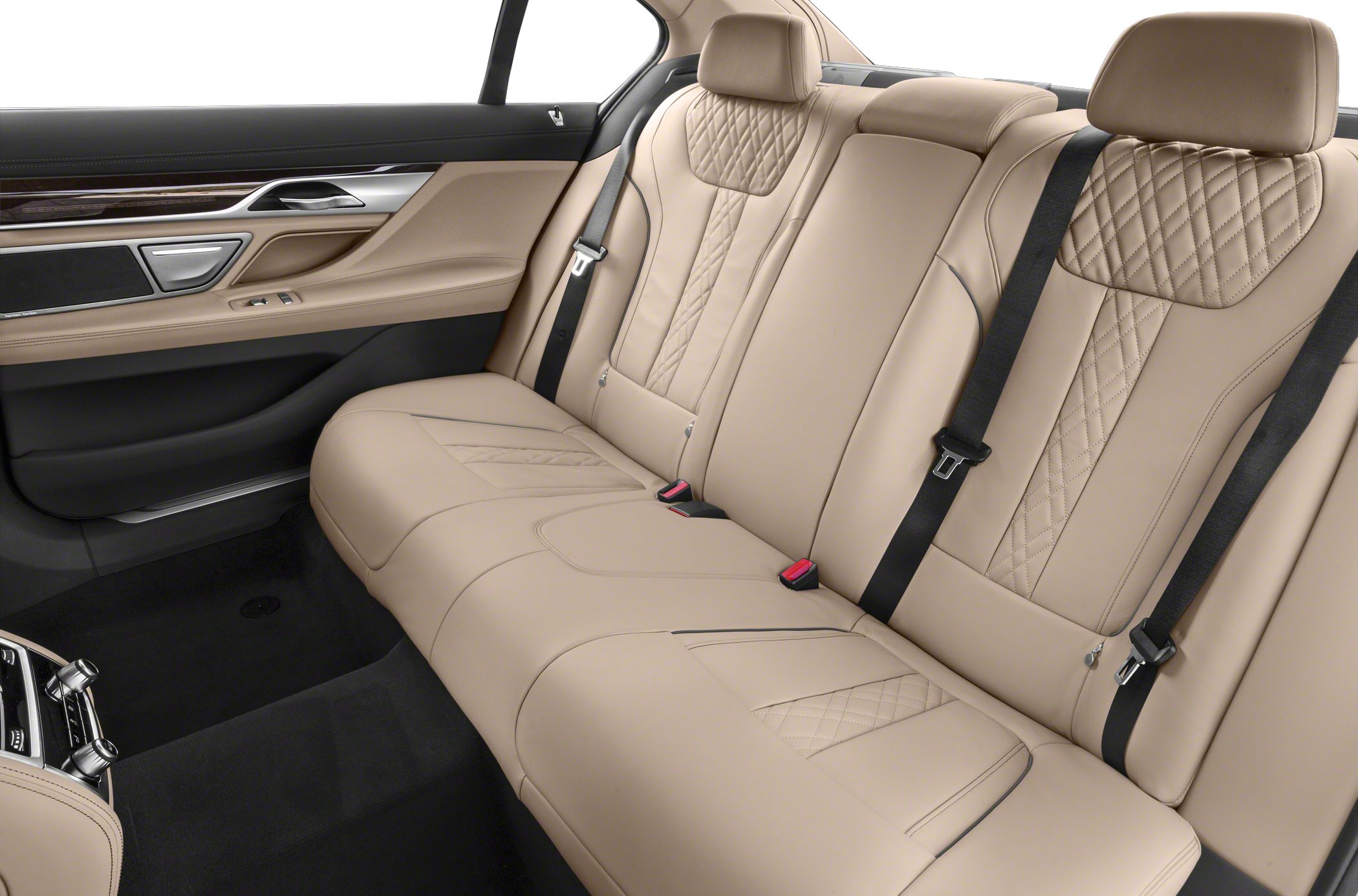 Beige quilted leather rear seats with black seat belts