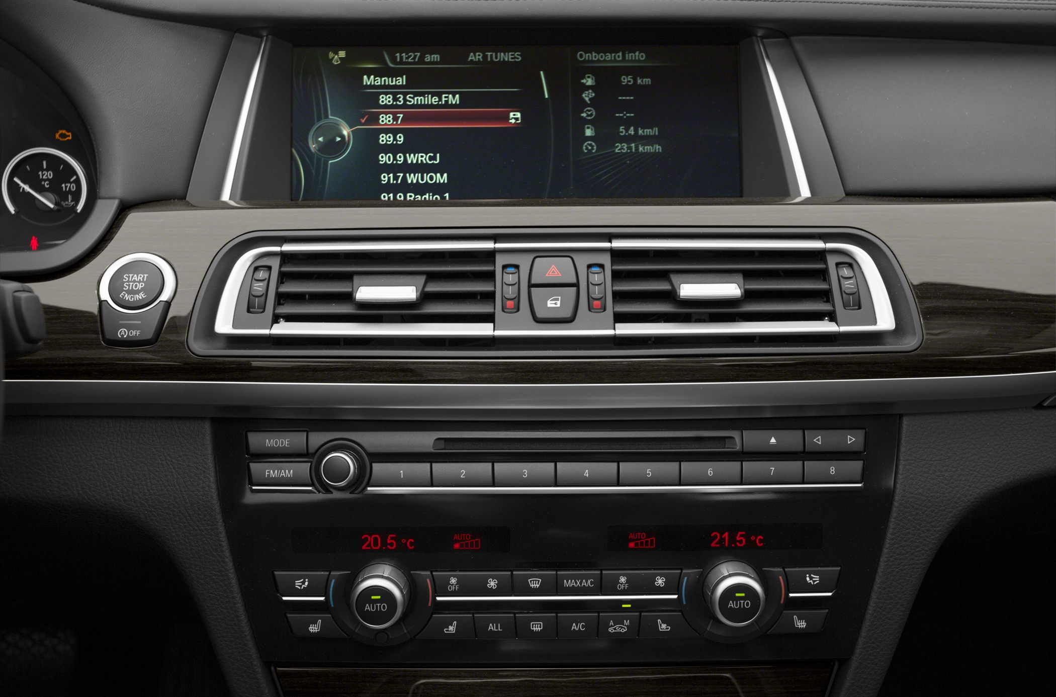 Dashboard and infotainment system with climate control and radio display