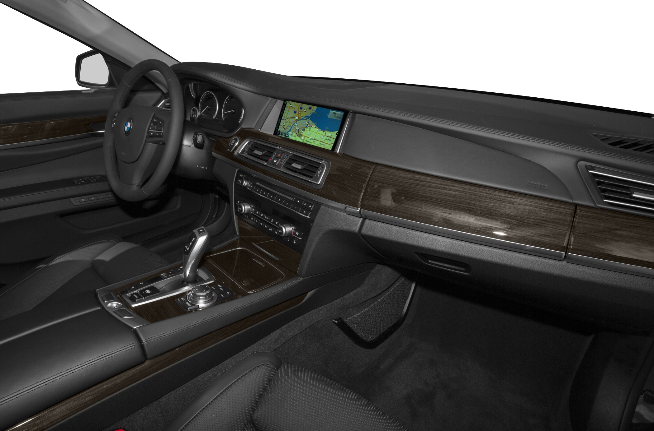 Luxury interior with wood trim dashboard and built-in navigation screen