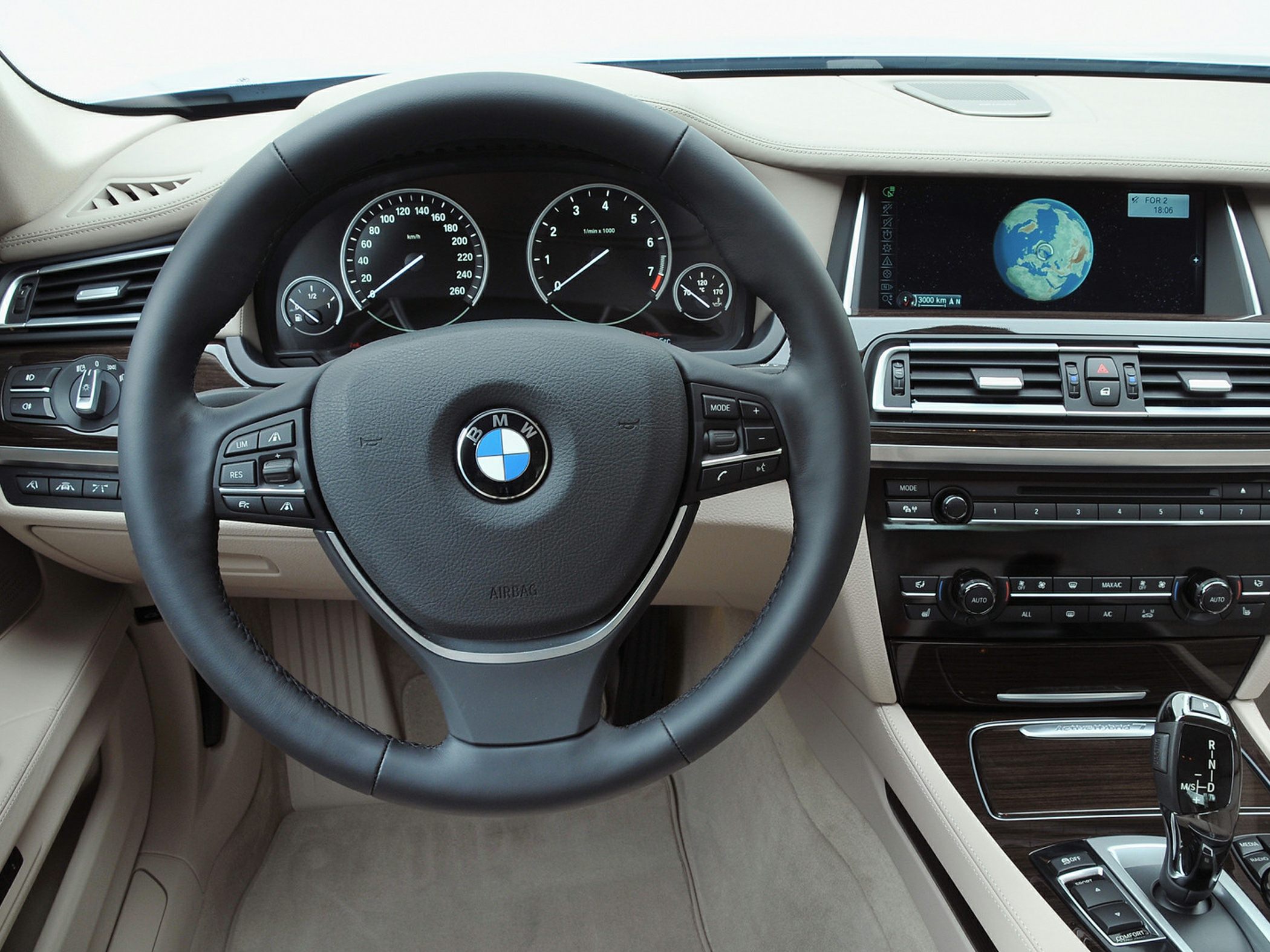 Luxury car interior with dashboard and steering wheel
