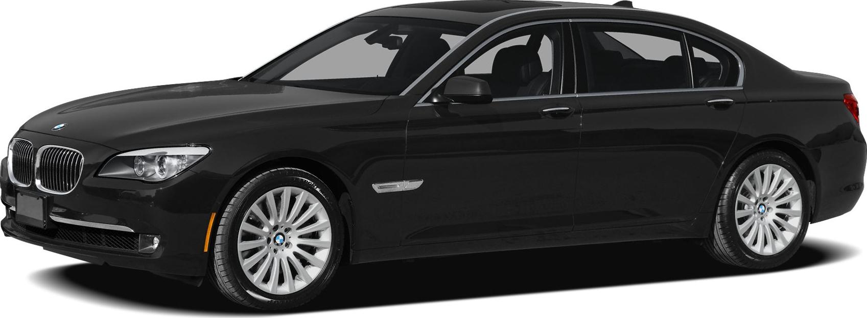 Front-side view of luxury sedan with distinctive wheels and sleek design