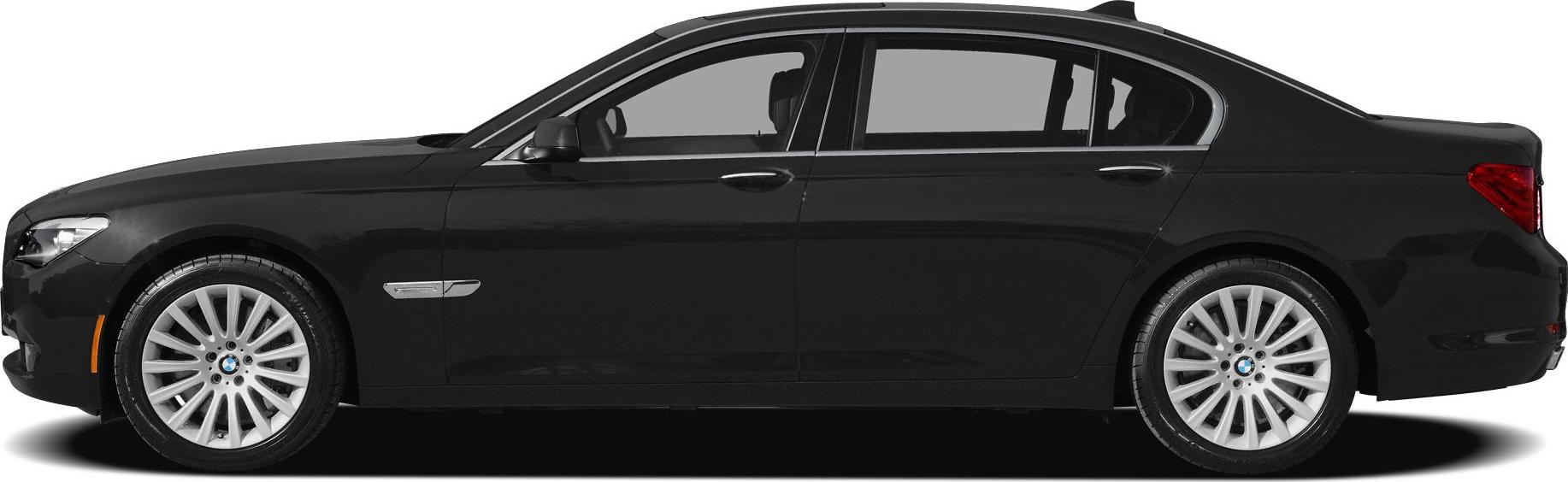 Side profile of long luxury sedan with distinctive alloy wheels