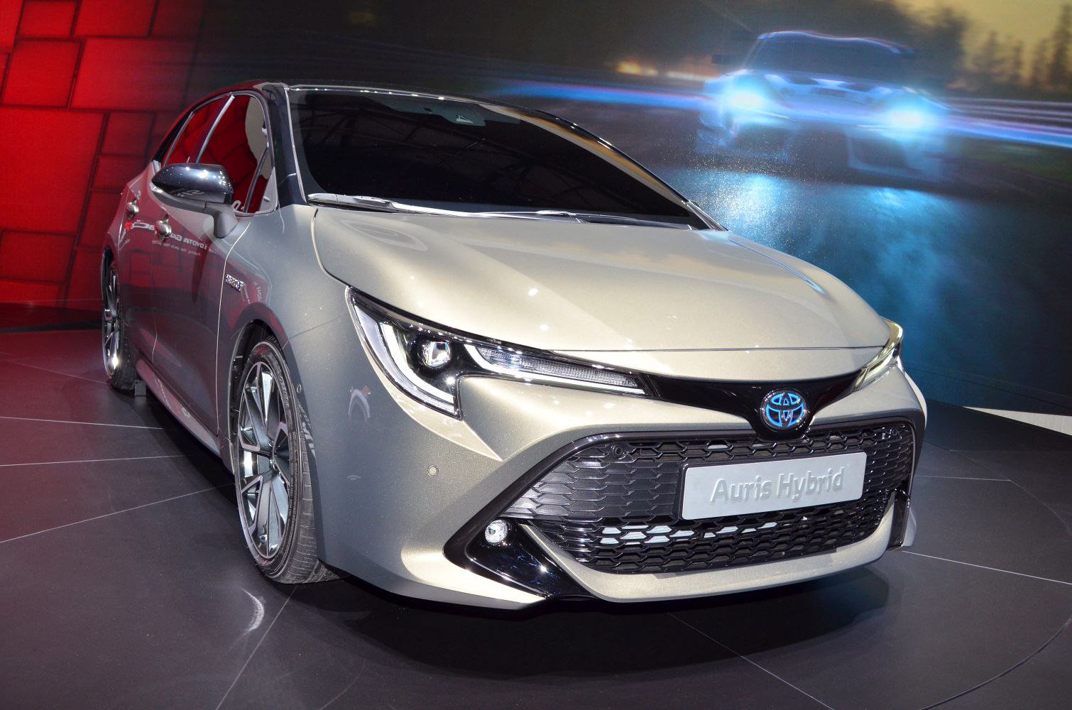 Modern hatchback front with LED headlights and honeycomb grille