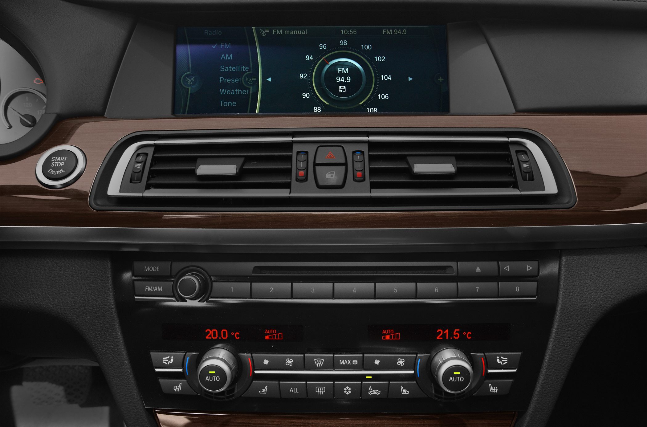 Infotainment screen and dual-zone climate control with wood trim dashboard