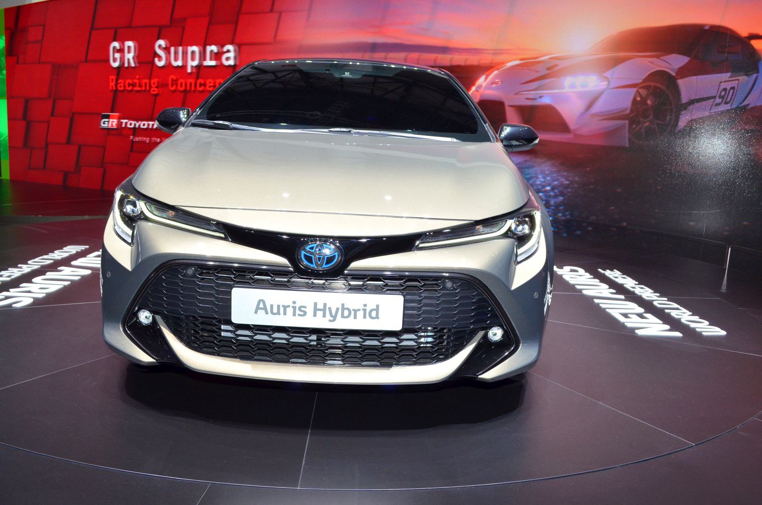 Front view with prominent grille and sleek LED headlights