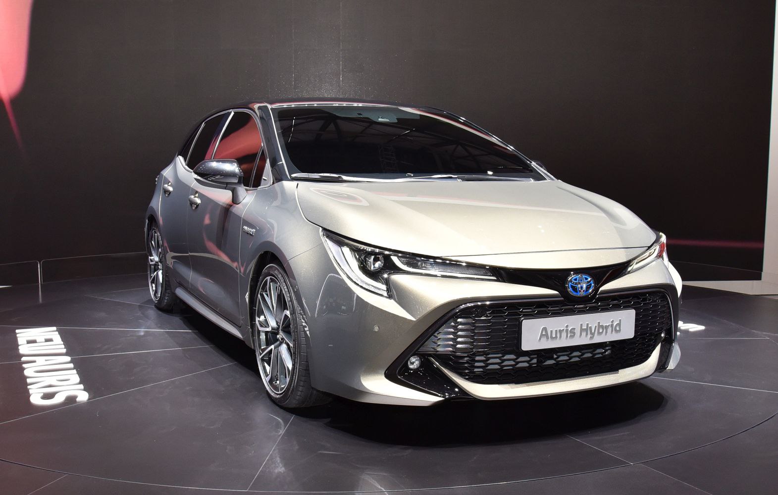 Sleek hatchback with LED headlights and large front grille