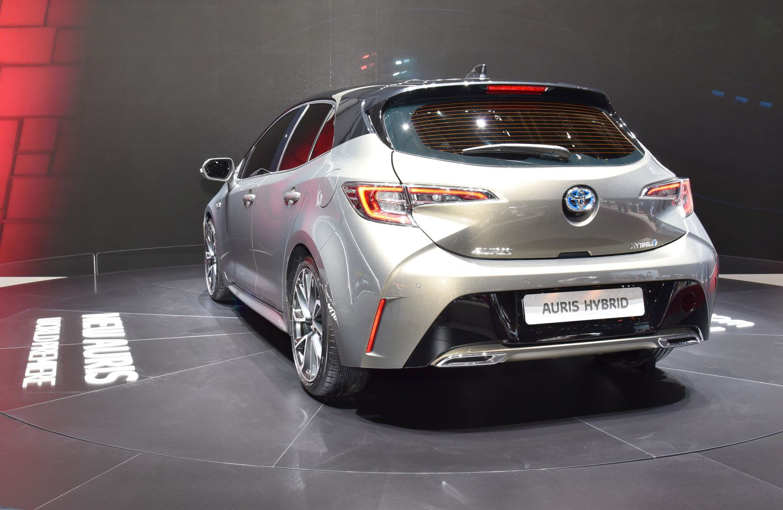 Rear view of a silver hatchback with LED taillights and alloy wheels