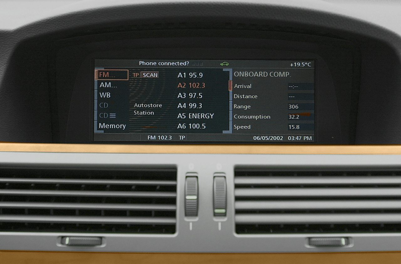 Infotainment display with radio stations and onboard computer data