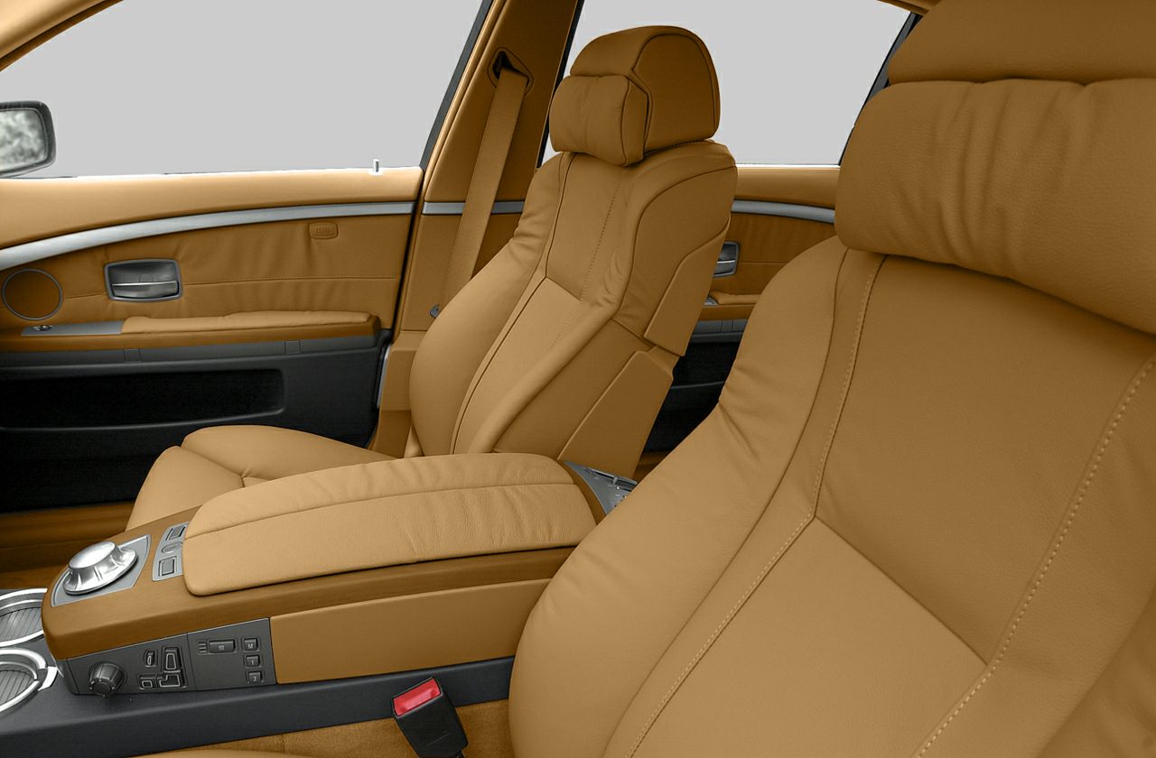 Luxury tan leather seats and central console controls