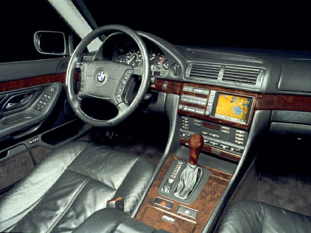 Leather seats interior with wood trim and built-in navigation system