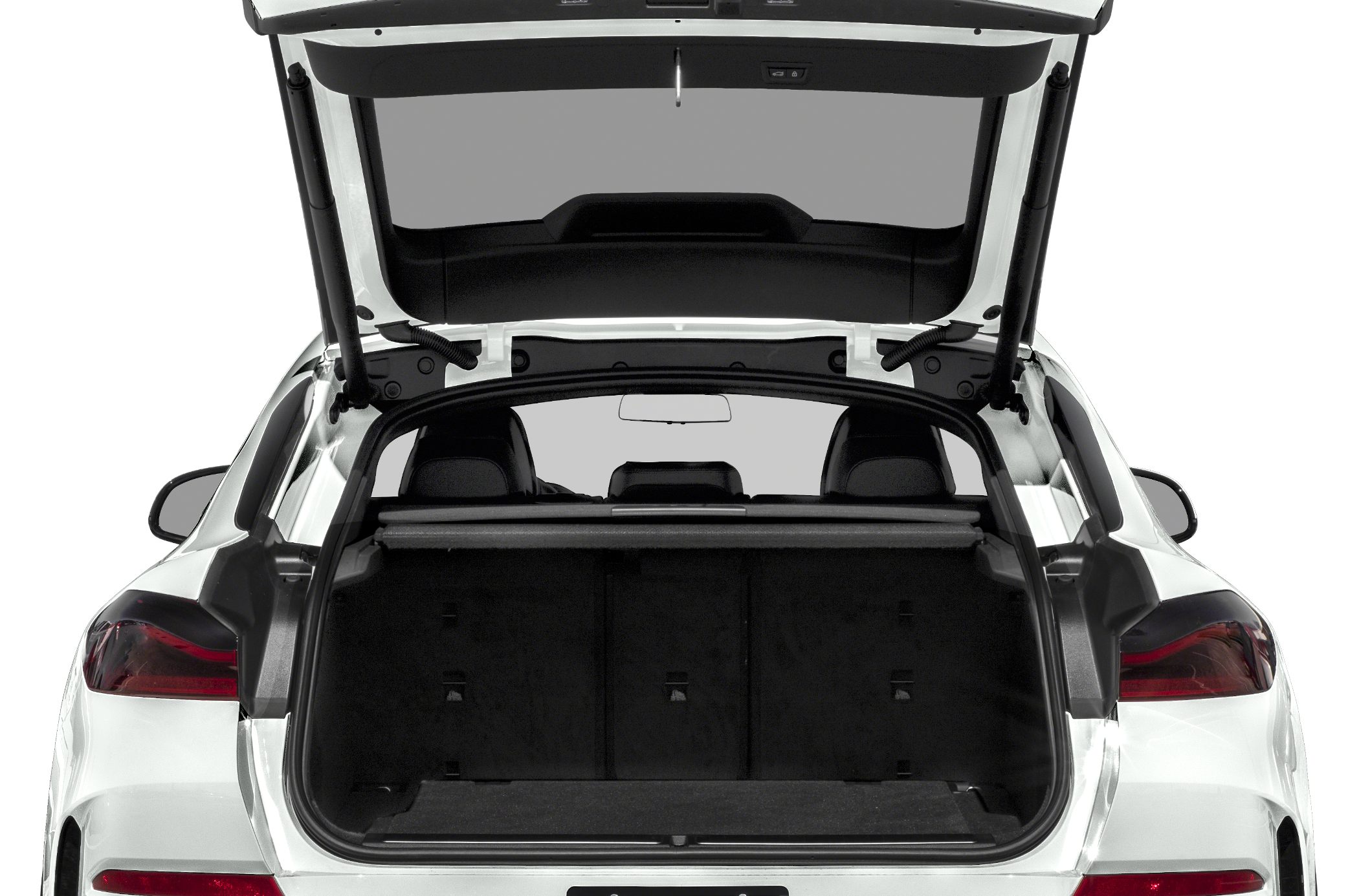 Open trunk rear view with spacious cargo and tail lights
