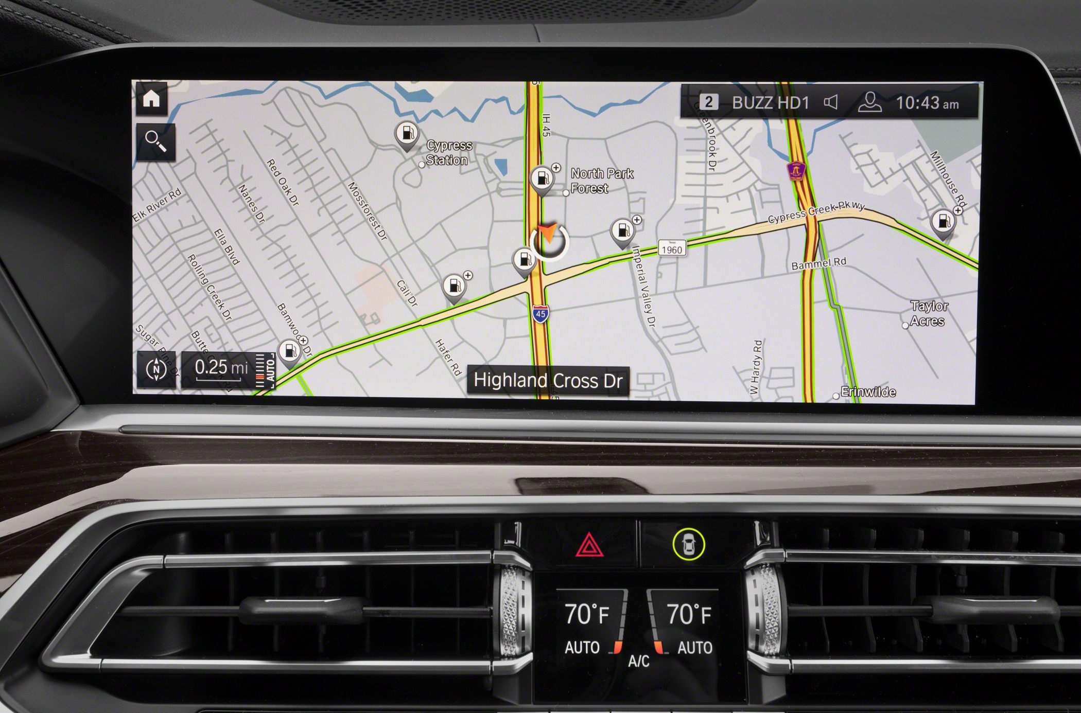 Car infotainment display showing GPS navigation and dual-zone climate control.