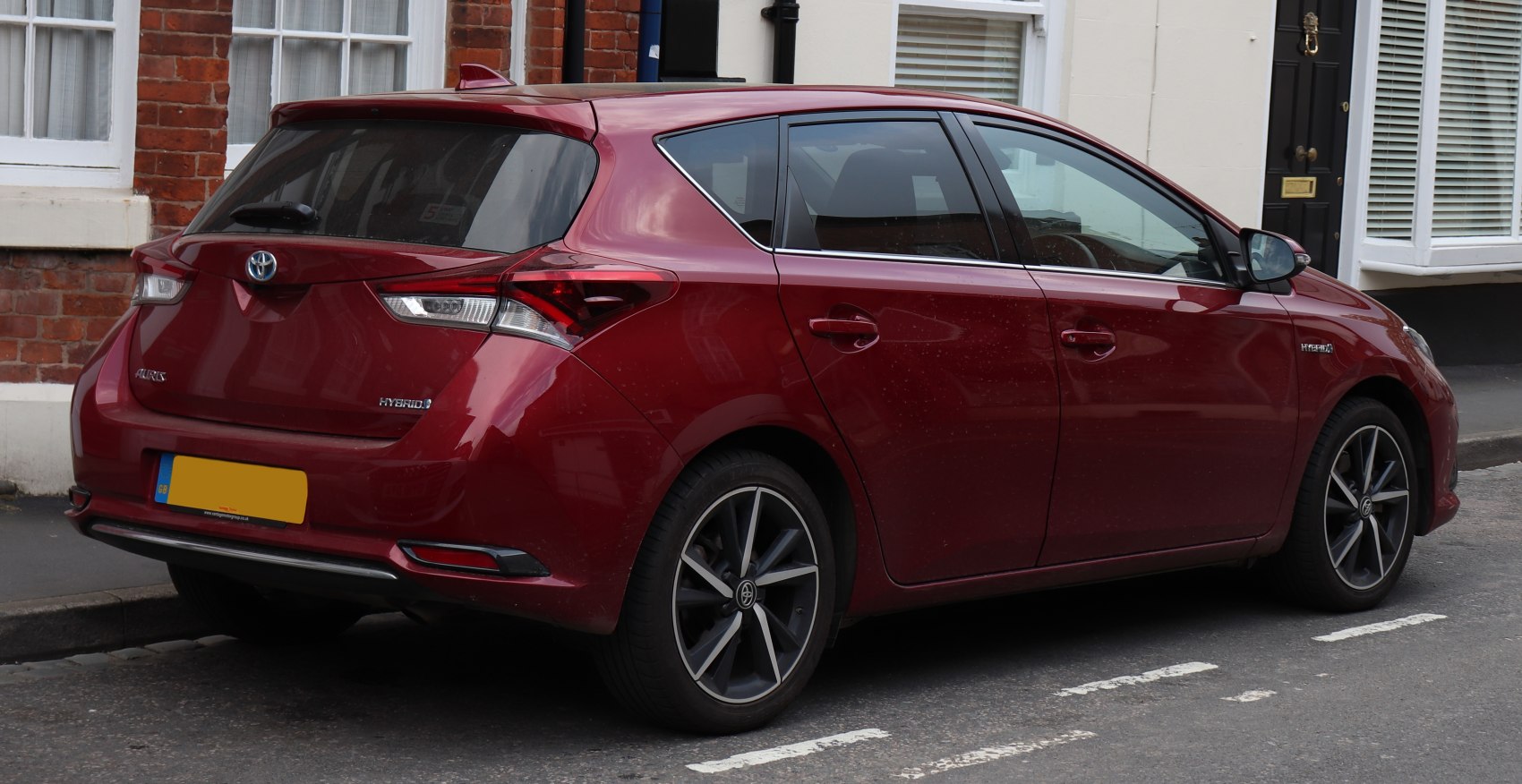 Rear and side view of hybrid hatchback with alloy wheels