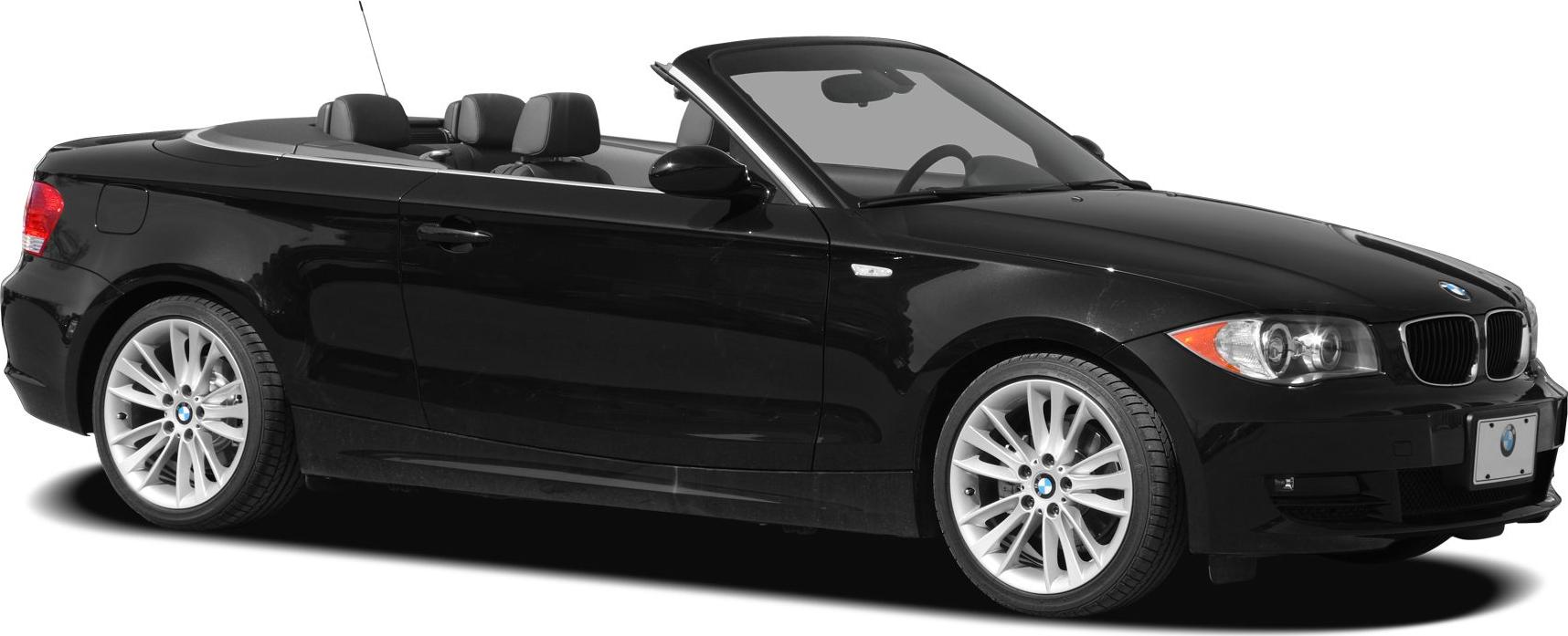 Black convertible sports coupe with soft top and alloy wheels
