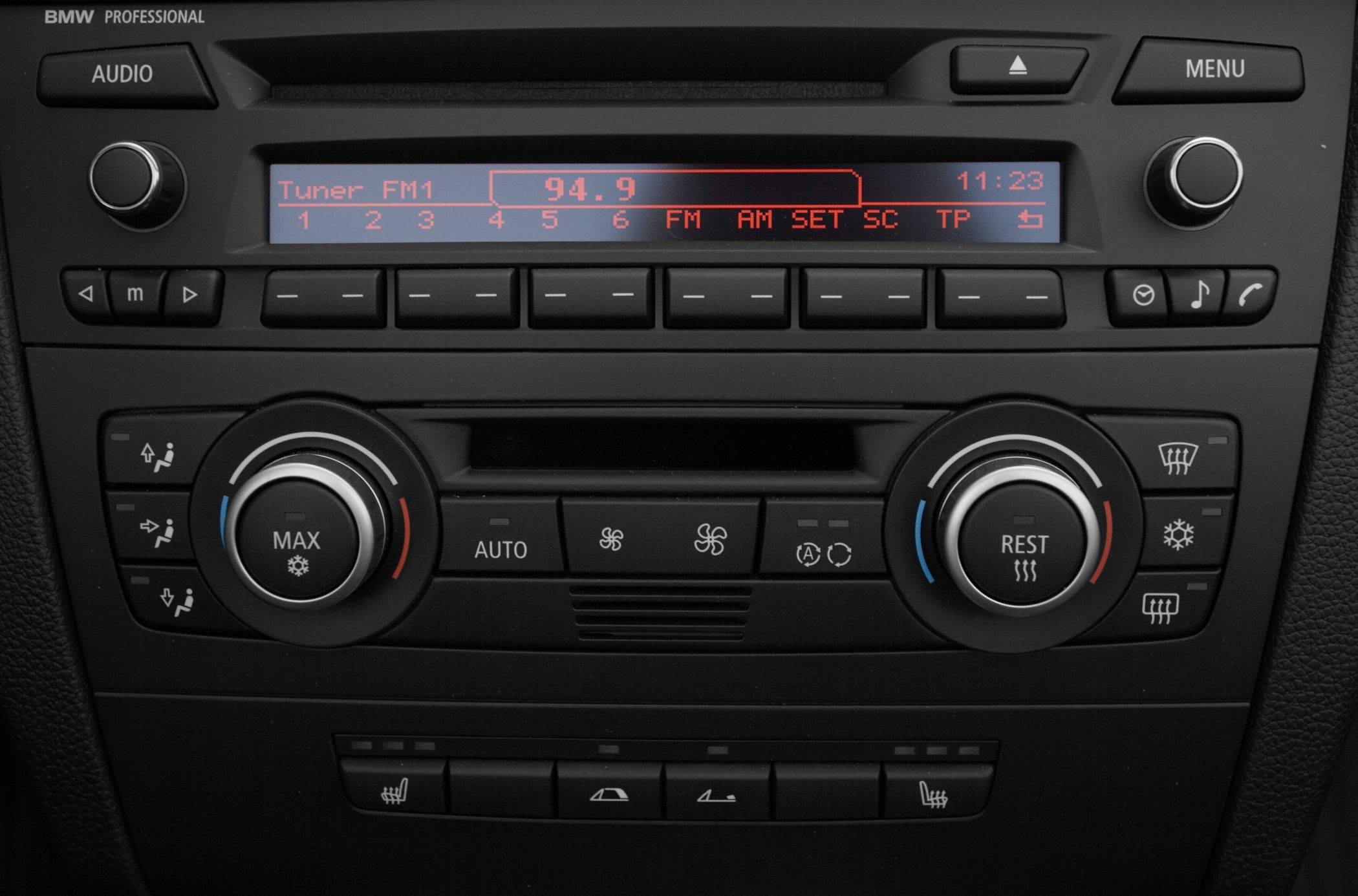 Car radio display and dual-zone climate control dashboard panel