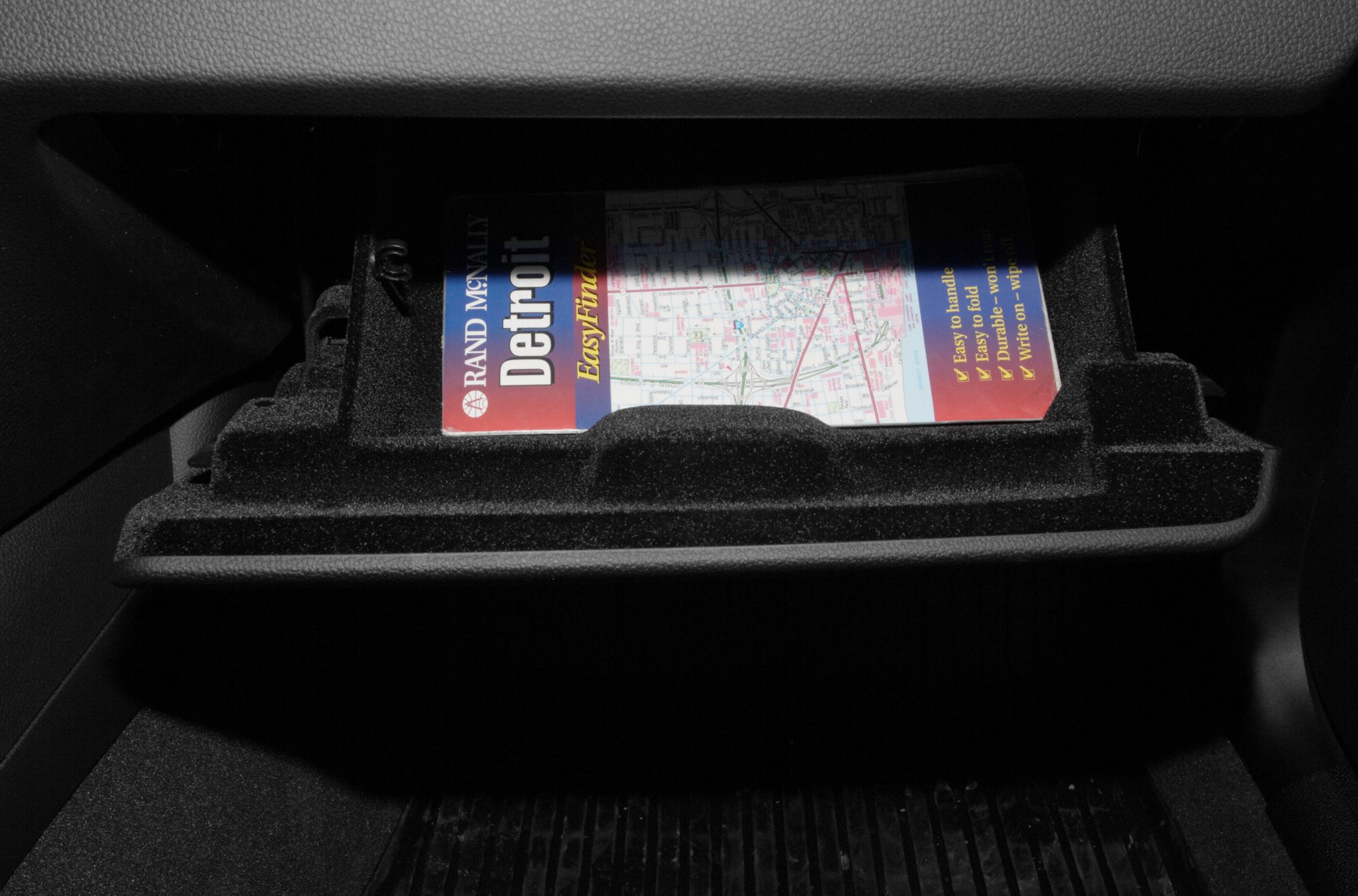 Glovebox compartment with map storage in vehicle interior
