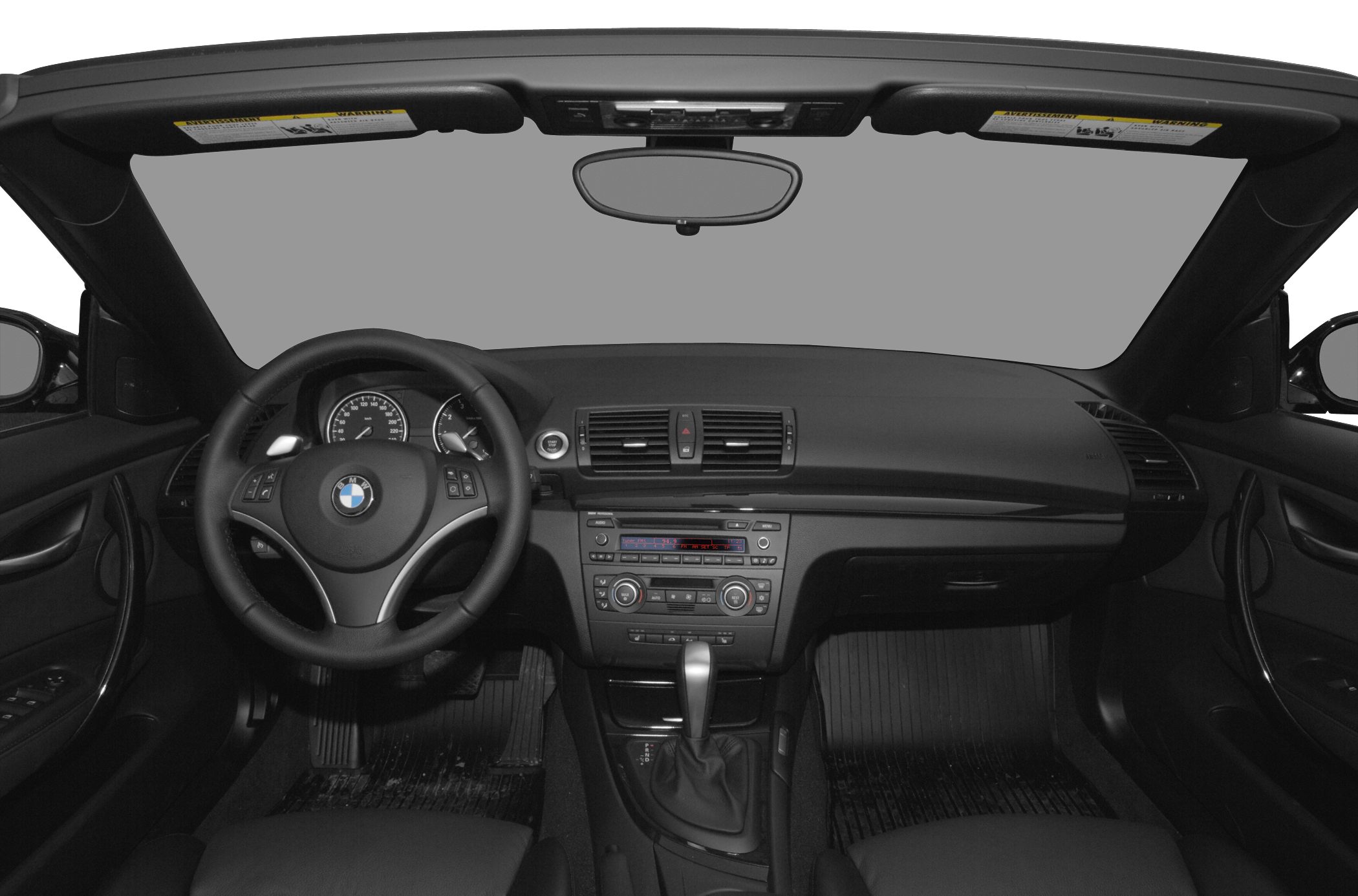 Dashboard and steering wheel interior view of convertible car