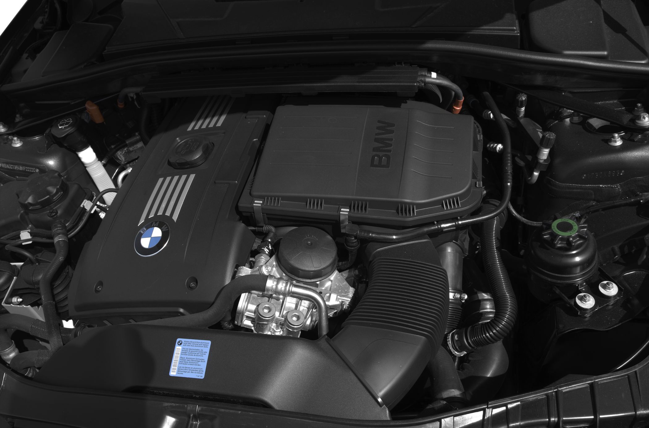 Engine bay with BMW engine cover and components