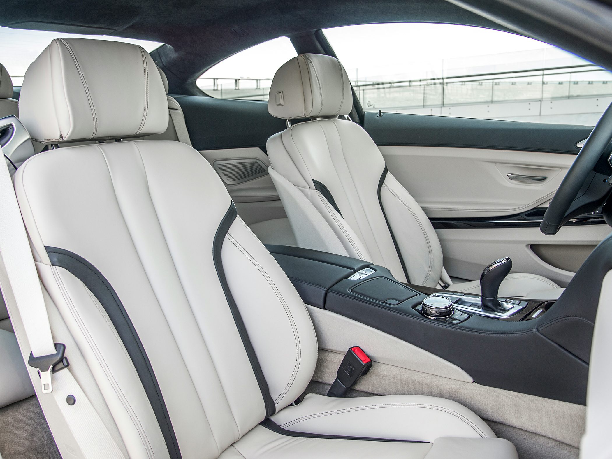 Beige leather seats and modern center console with gear shifter