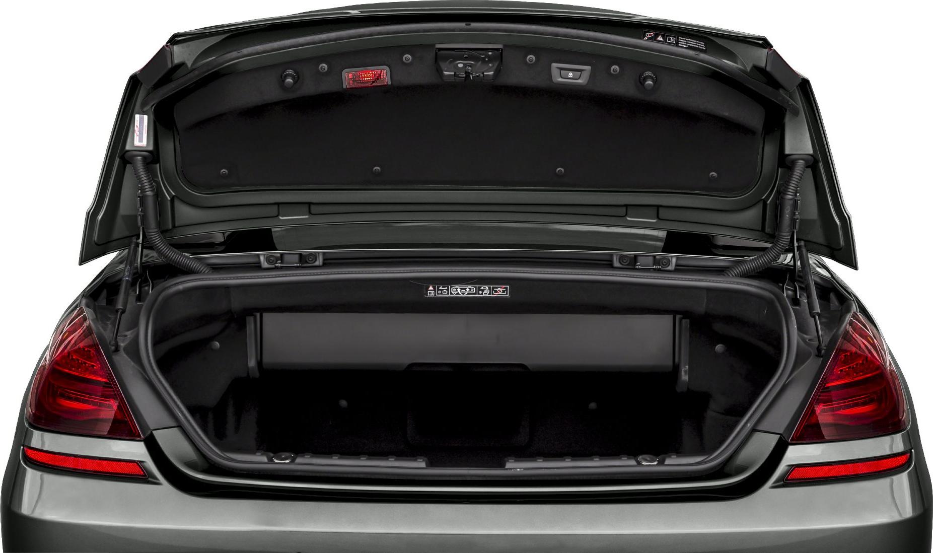 Open trunk of a luxury convertible showing spacious rear compartment