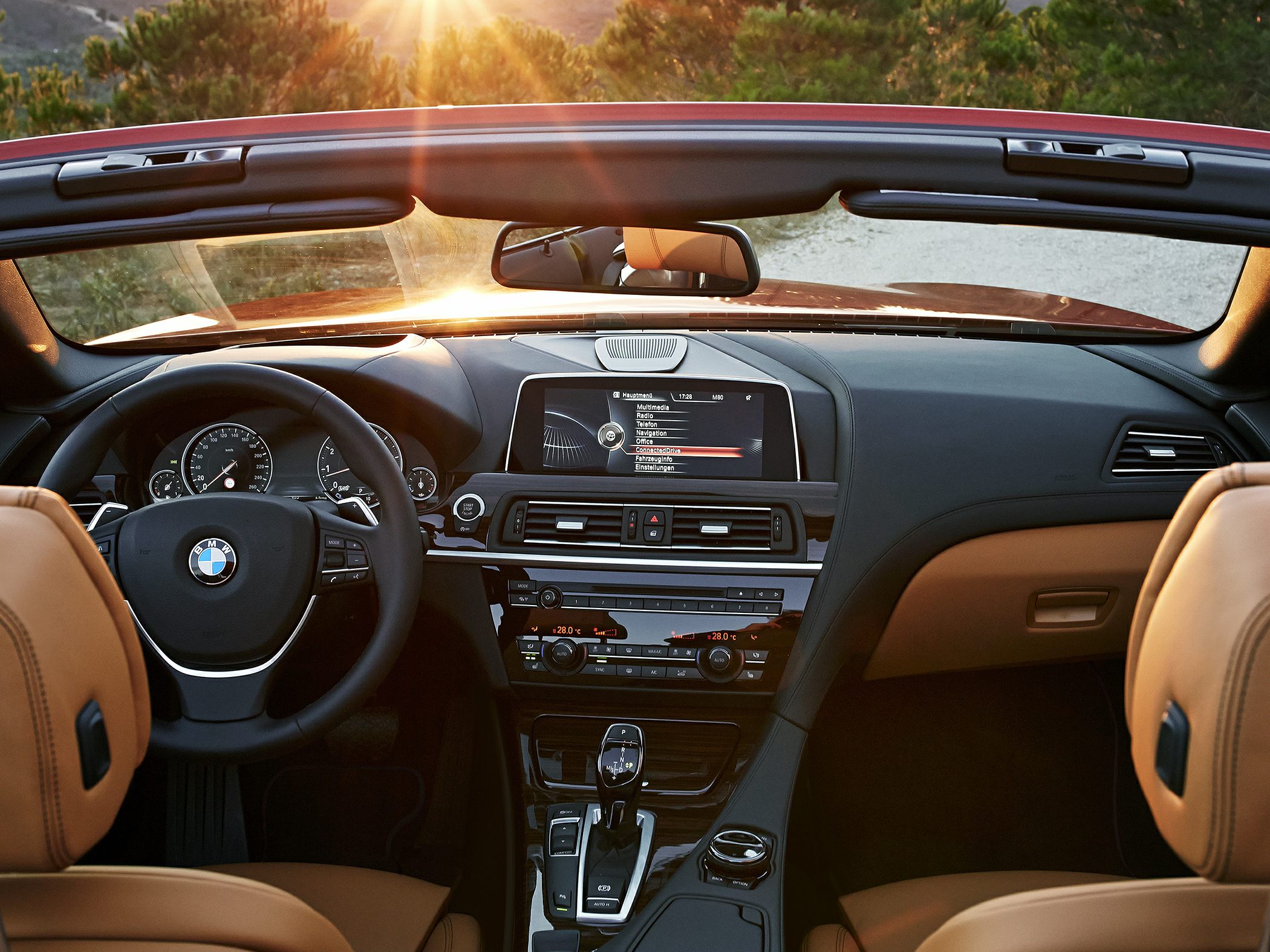 Convertible dashboard, steering wheel, center console with infotainment