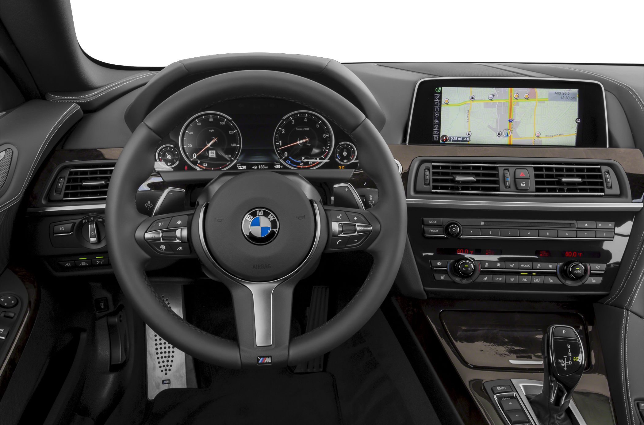 Dashboard with digital cluster, multifunction steering wheel, and navigation display
