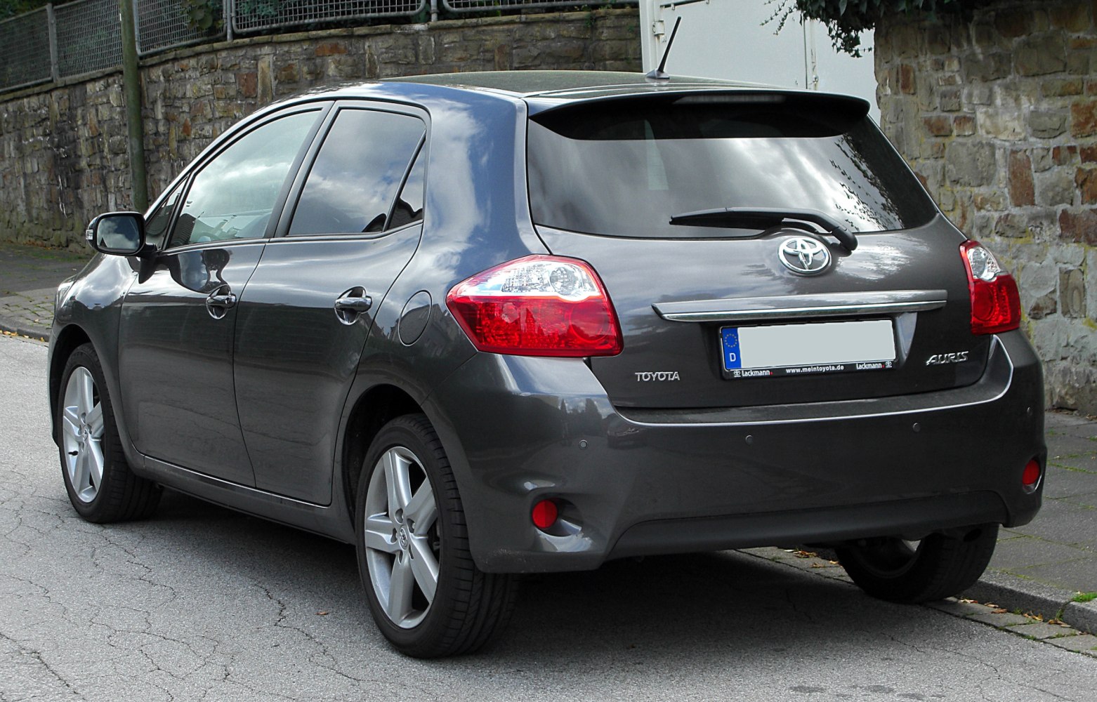 Rear view hatchback with distinctive taillights and alloy wheels