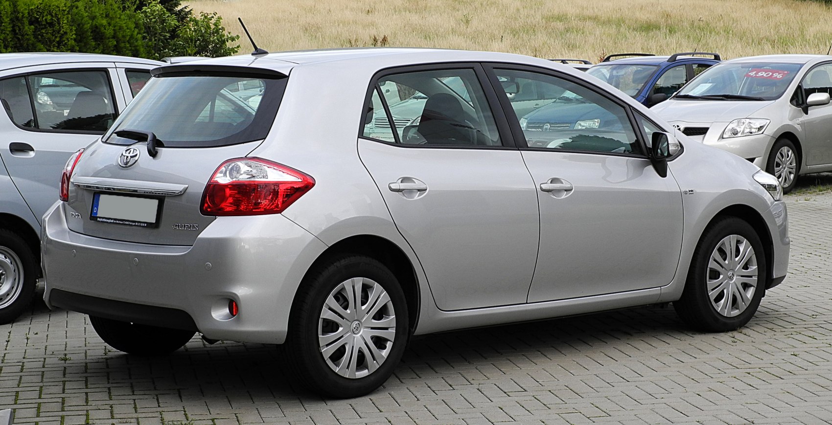 Rear side view of a compact hatchback with distinct taillights and five-door layout