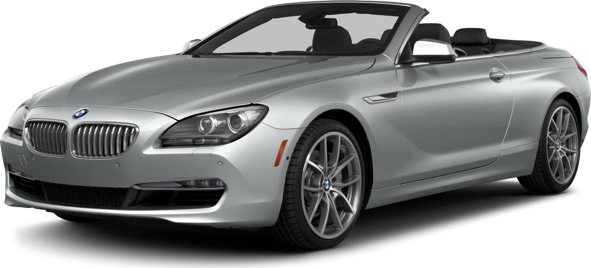 Silver convertible luxury sports car front side view with alloy wheels