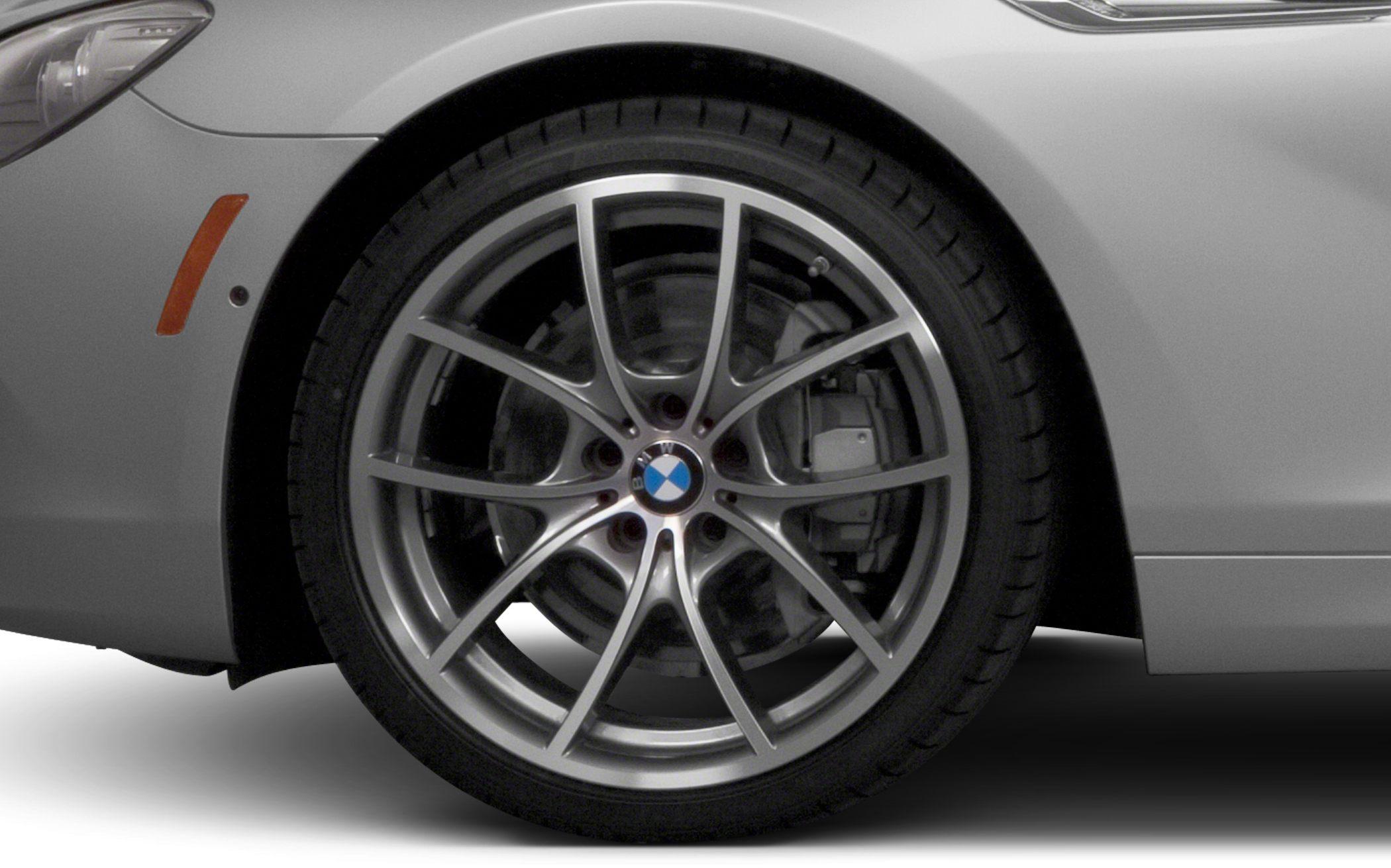 Close-up of multi-spoke alloy wheel with visible brake caliper