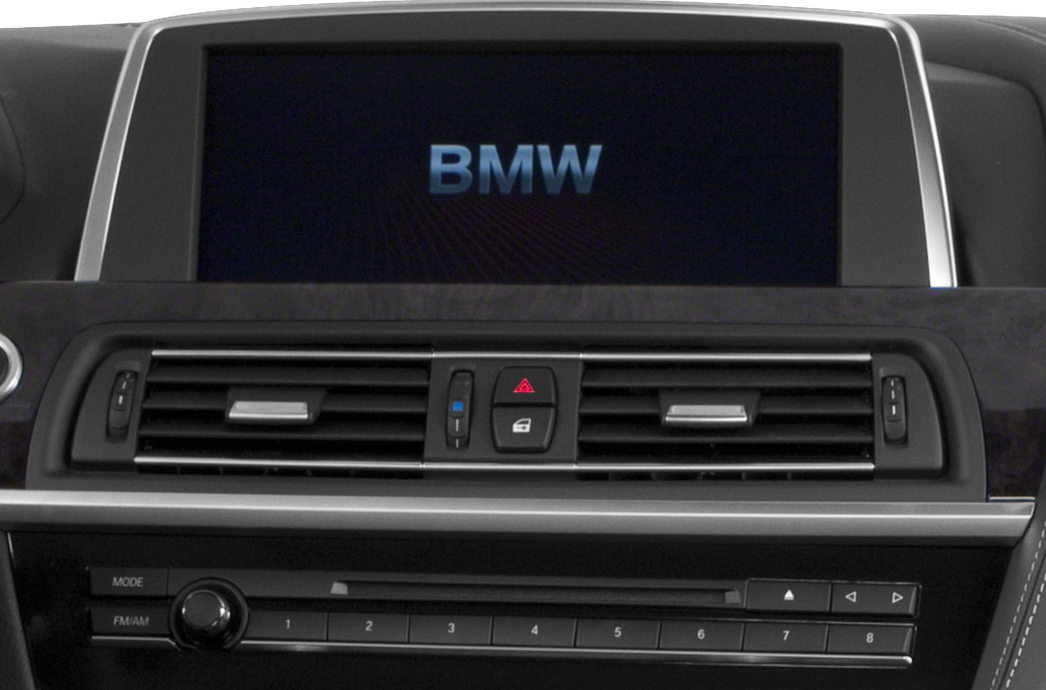Infotainment display and air vents with control buttons on dashboard