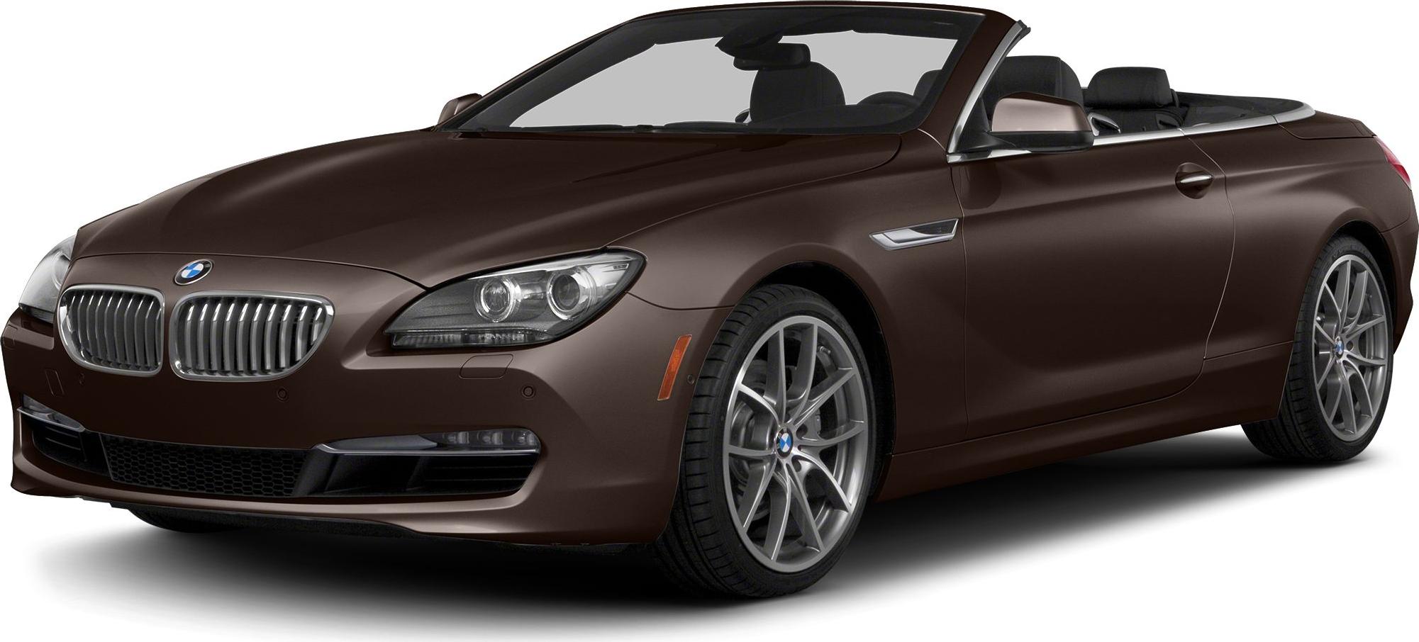 Front grille, headlights, and alloy wheels of a luxury convertible.