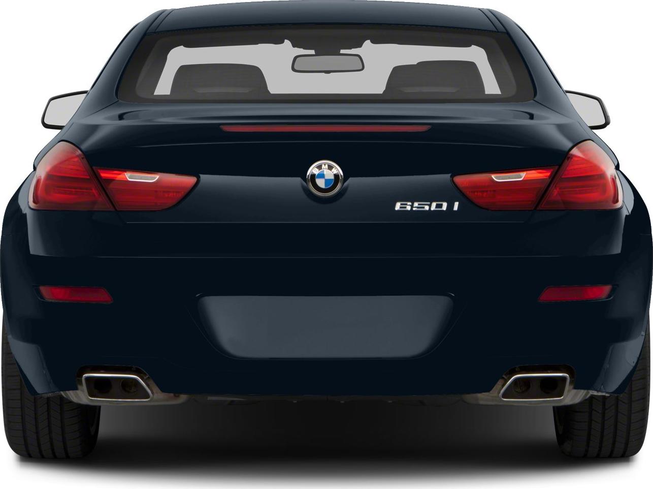 Rear view with distinctive taillights and dual exhausts