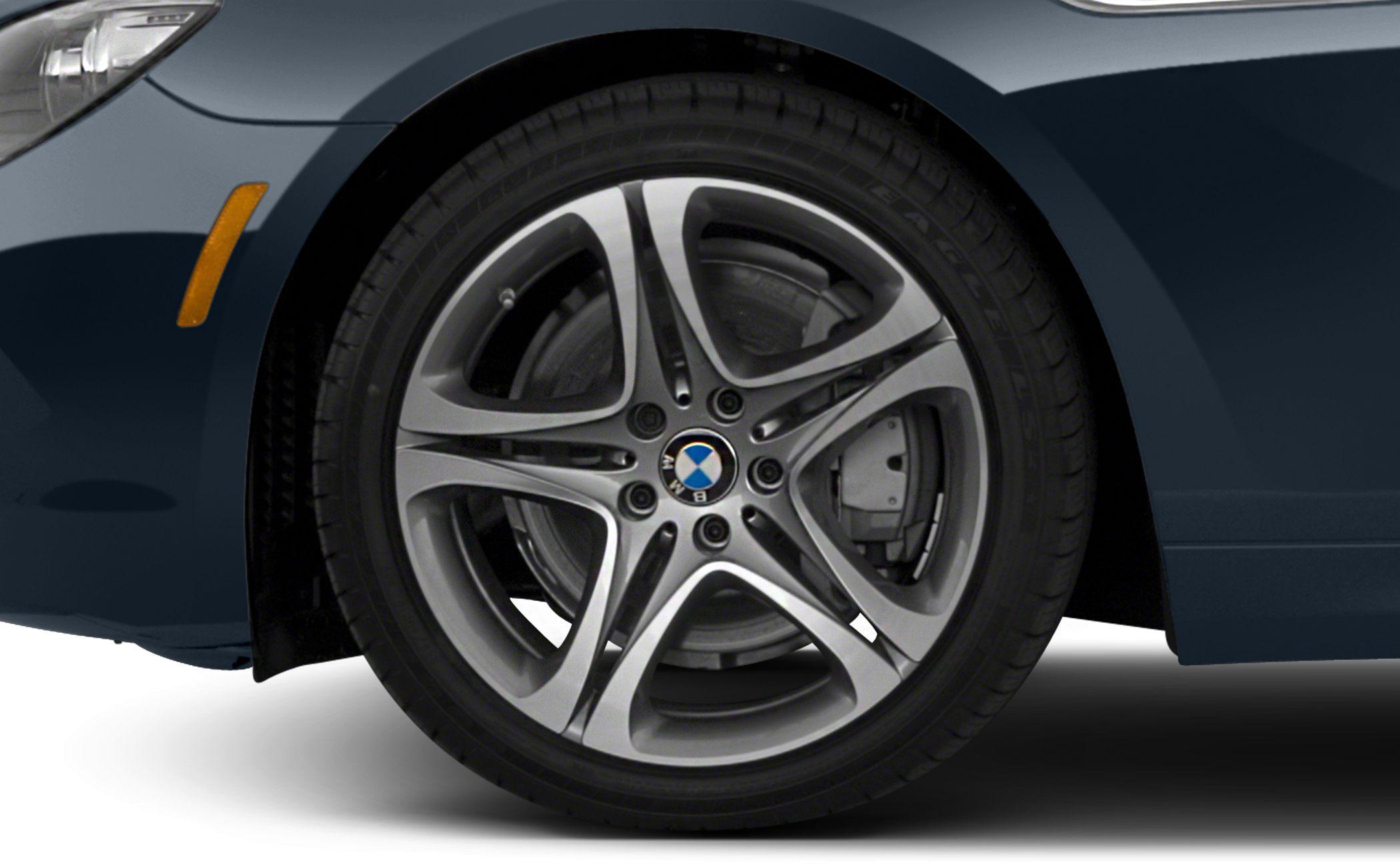 Alloy wheel and tire close-up with brake disc visible