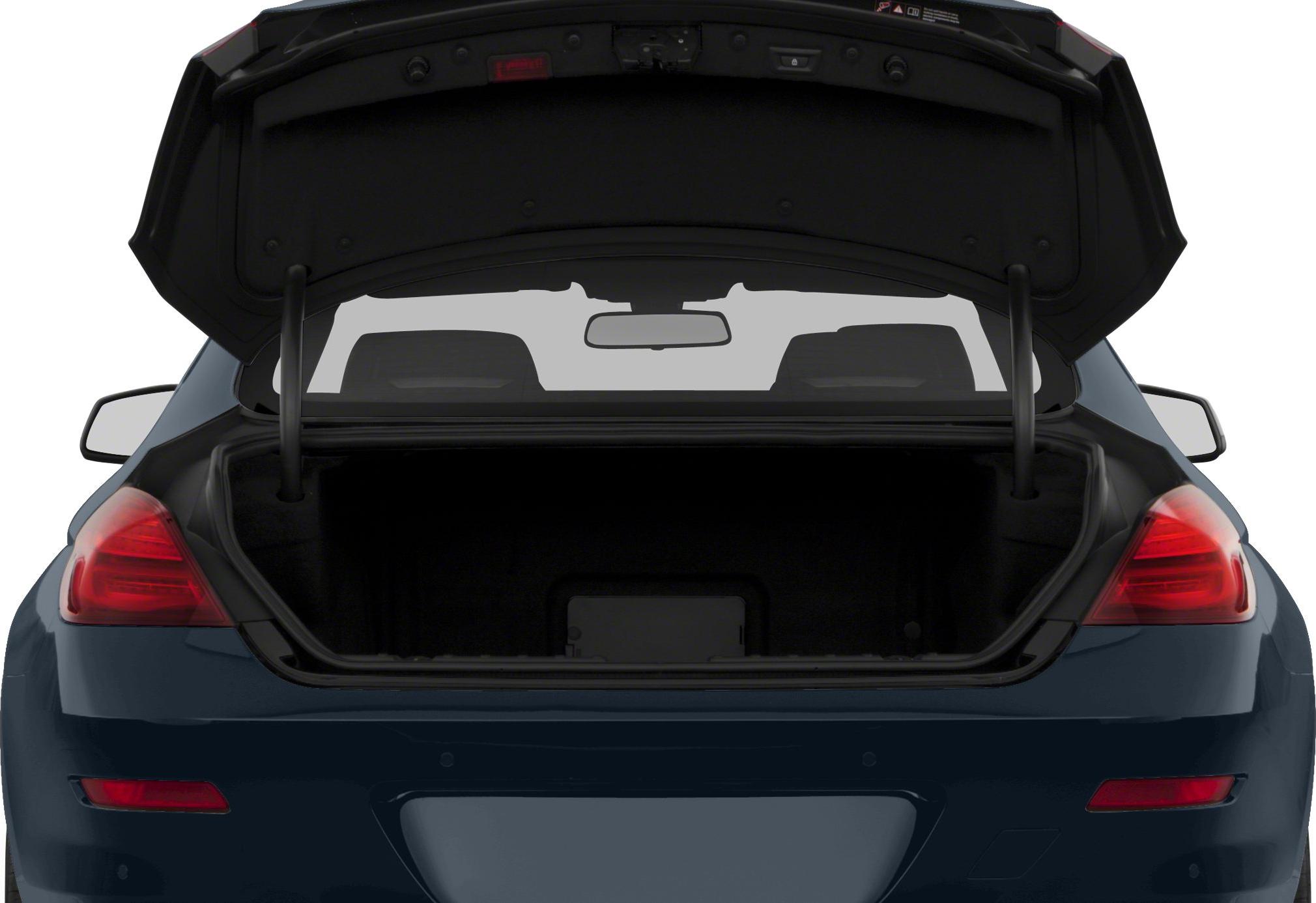 Open trunk rear view with taillights and spacious cargo area