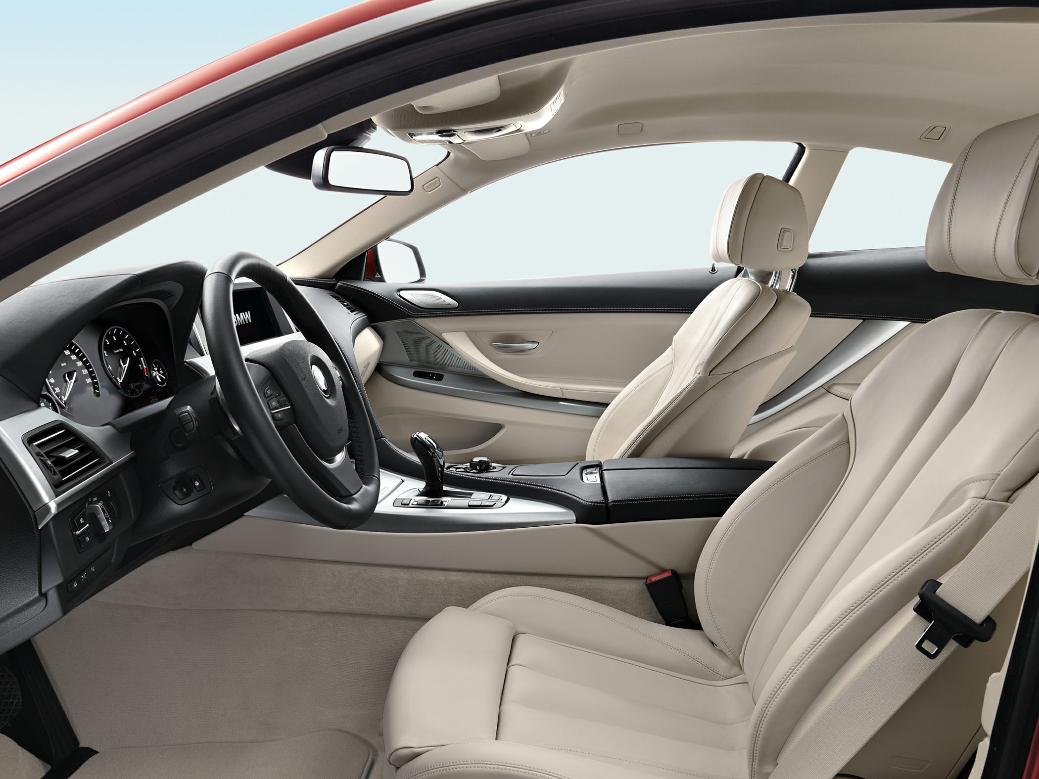 Beige leather seats and modern dashboard interior design