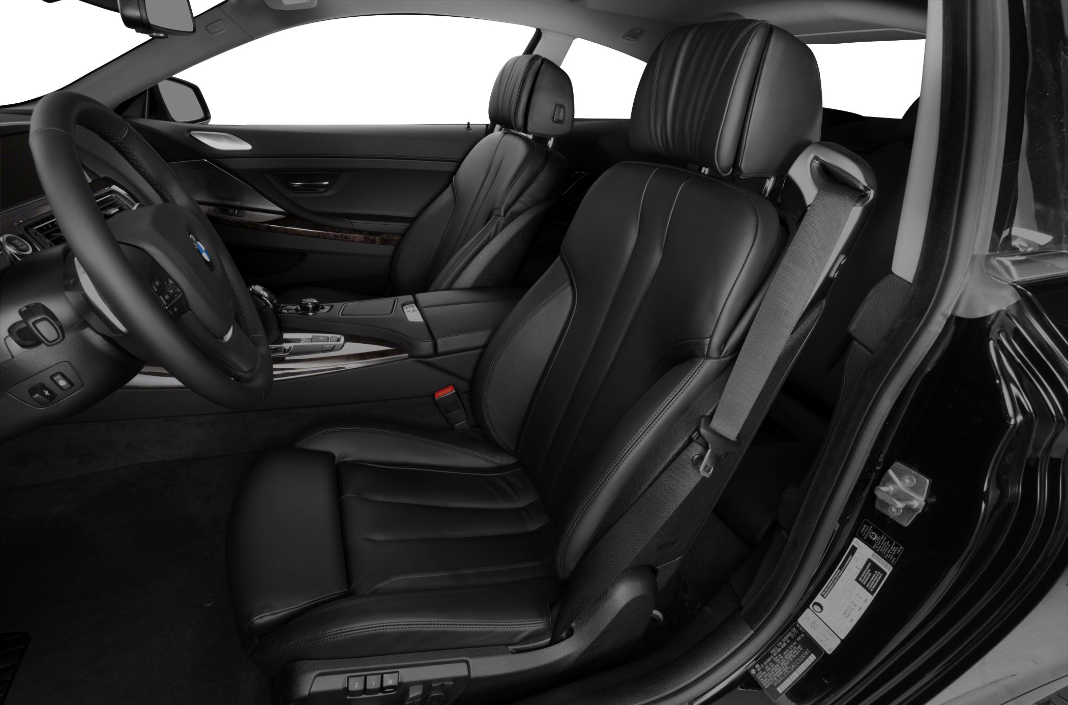 Black leather seats and luxury car interior with steering wheel and dashboard